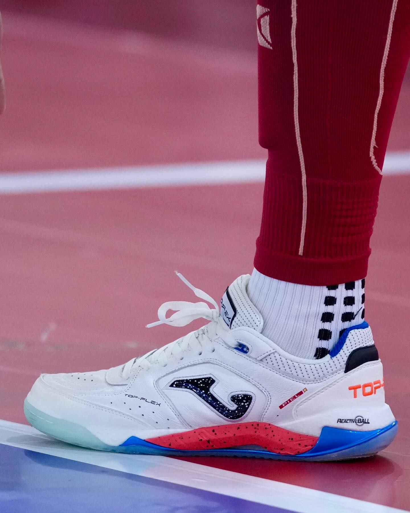 Joma Top Flex Plus futsal shoe on an indoor court